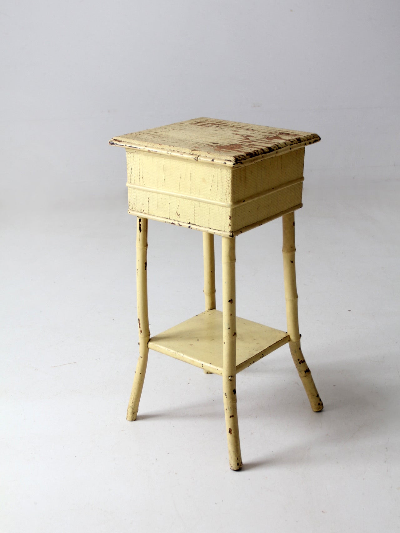 antique bamboo side table with storage top