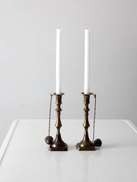 antique brass candlestick holders pair with hanging snuffers