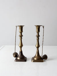 antique brass candlestick holders pair with hanging snuffers