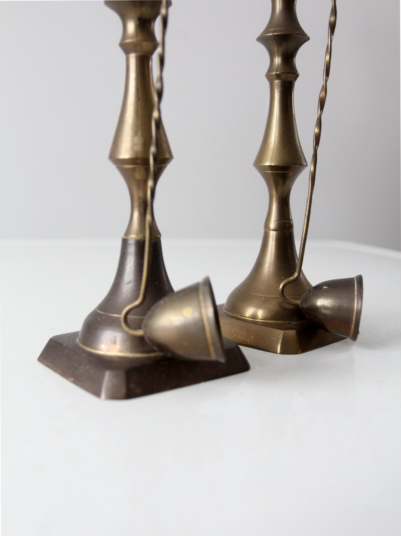 antique brass candlestick holders pair with hanging snuffers