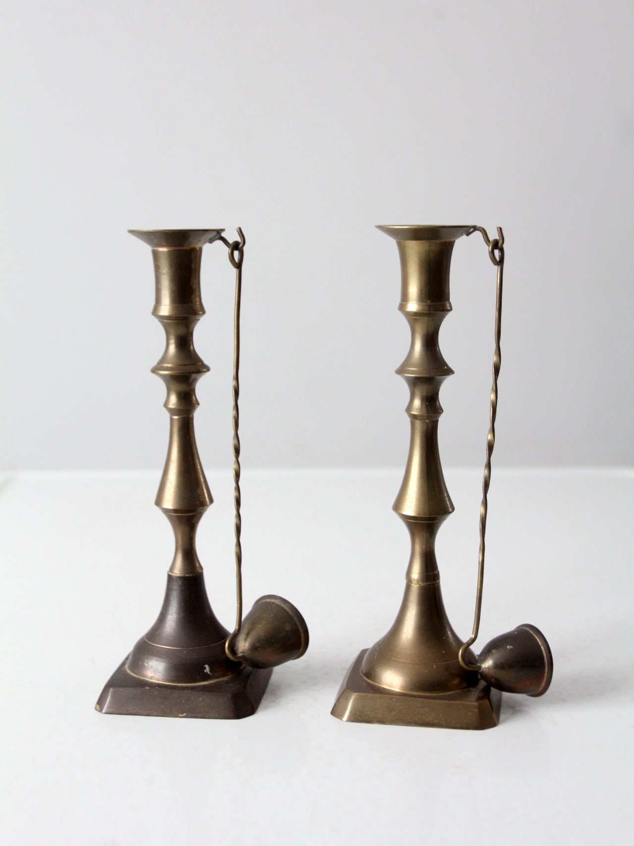 antique brass candlestick holders pair with hanging snuffers