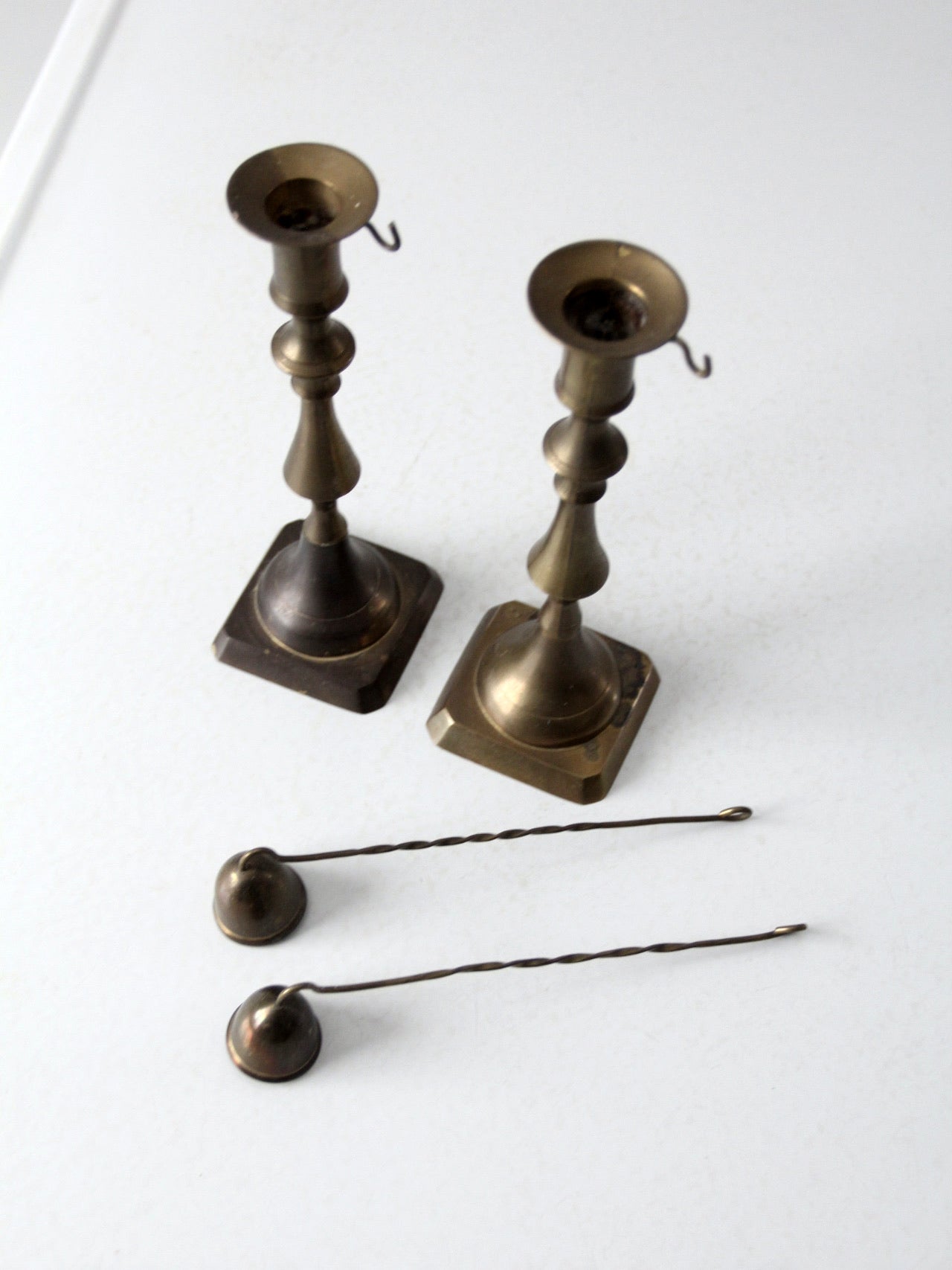 antique brass candlestick holders pair with hanging snuffers