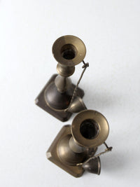 antique brass candlestick holders pair with hanging snuffers