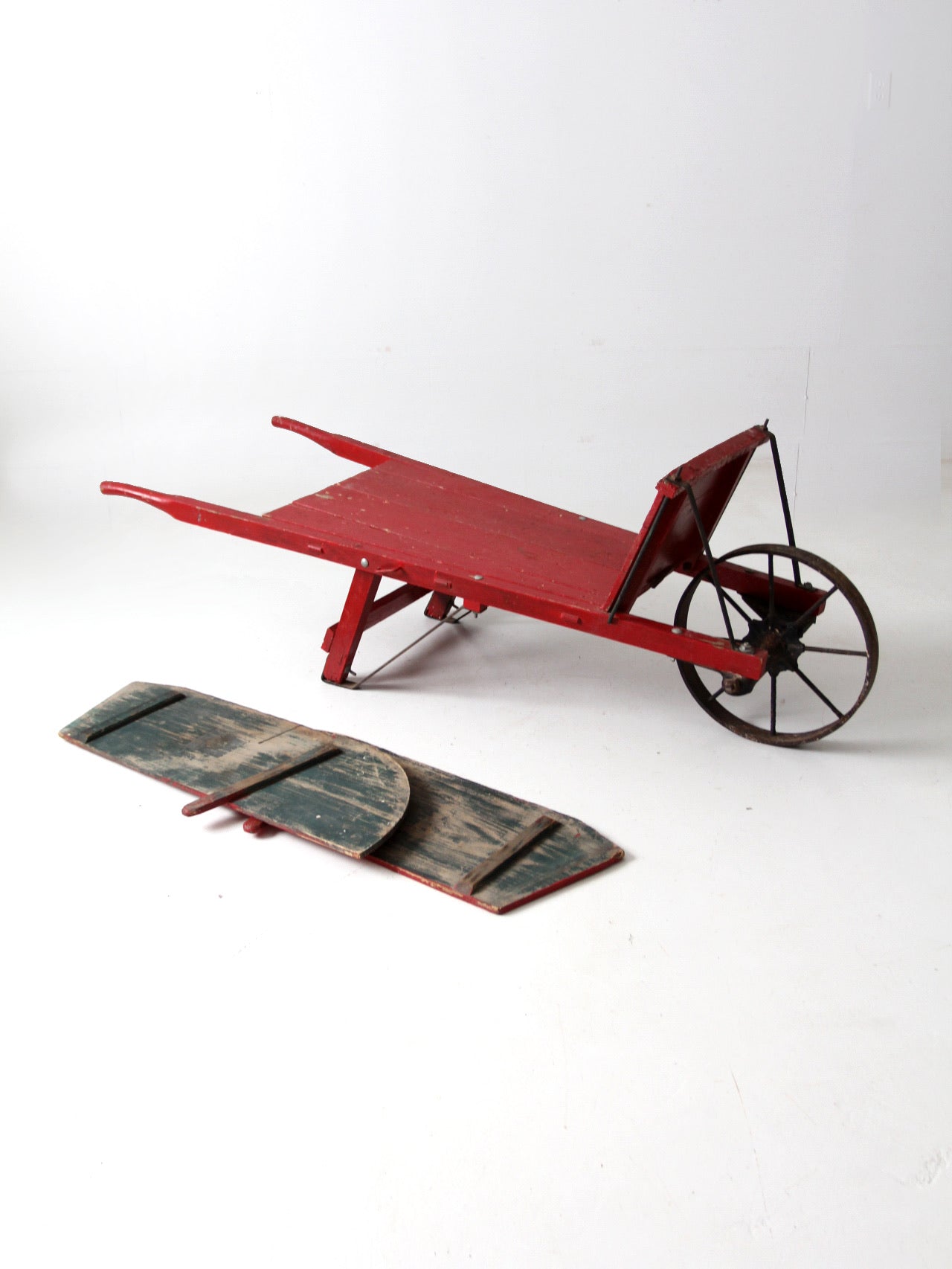 antique wooden wheelbarrow