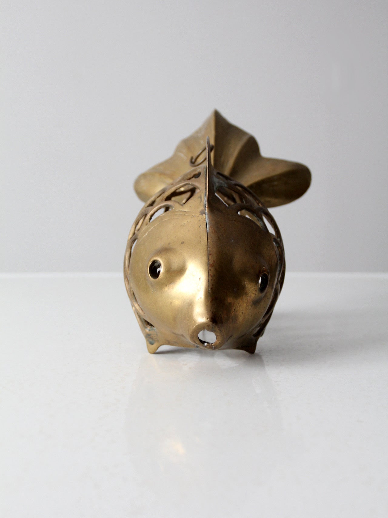 mid-century brass fish