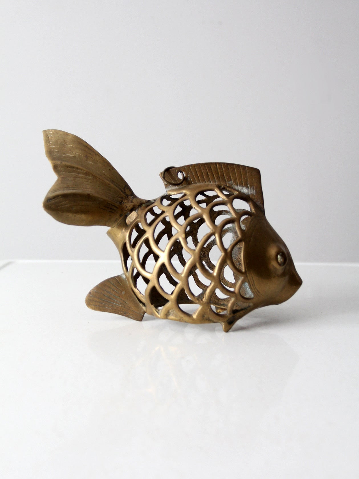 mid-century brass fish