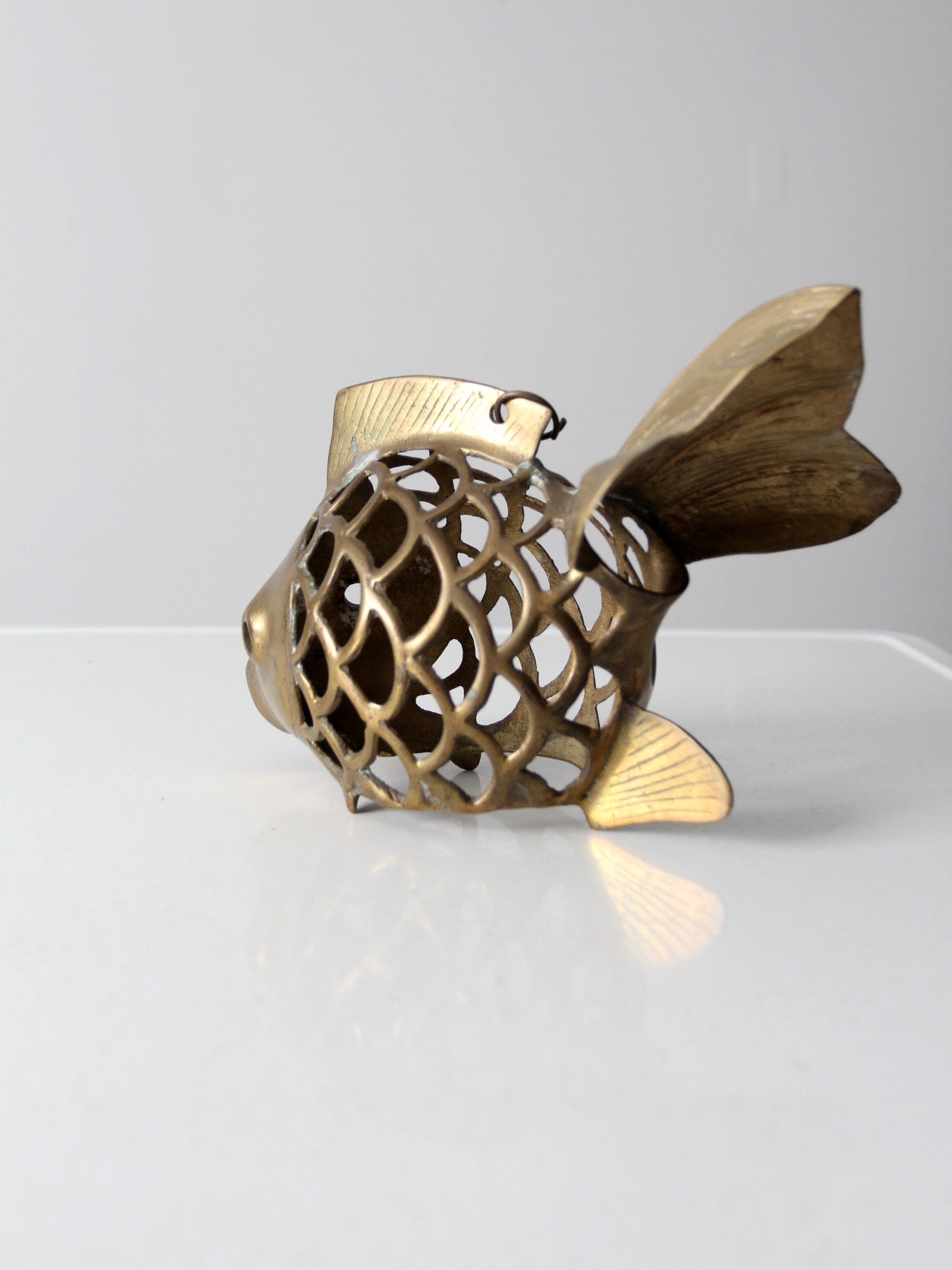 mid-century brass fish