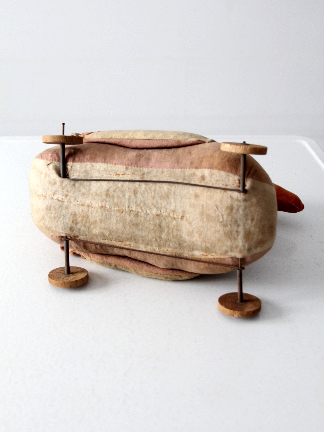 antique toy duck on wheels