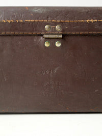 vintage brown leather suitcase