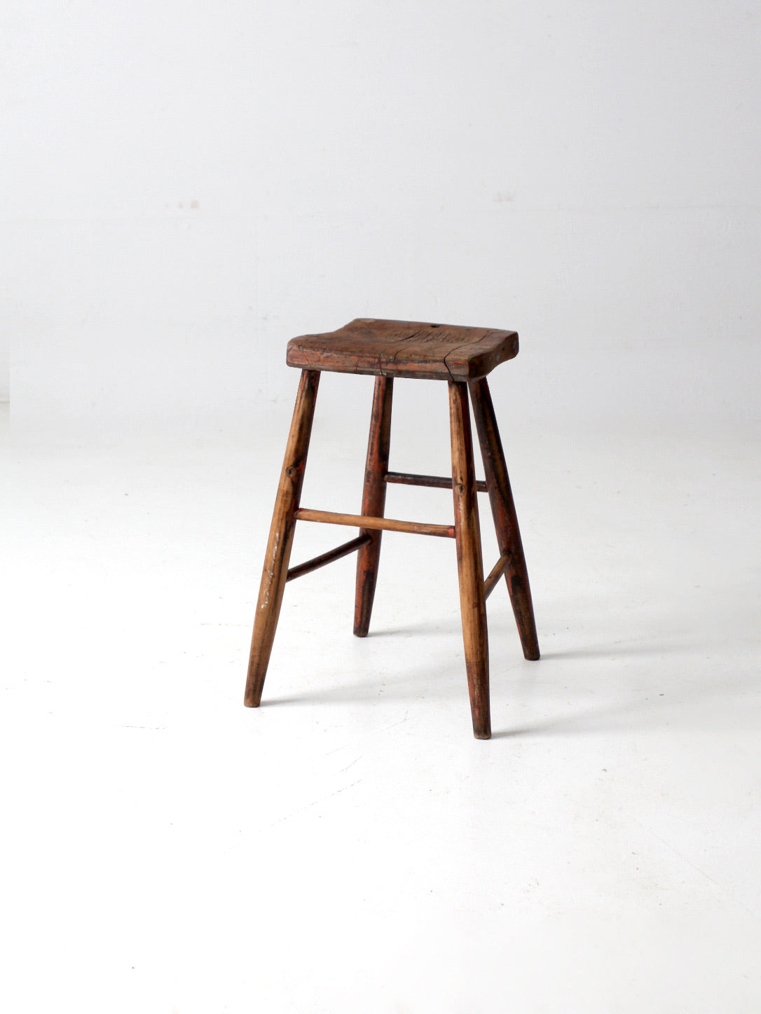 antique saddle seat wooden stool