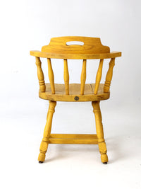 mid-century Buckstaff captains chair