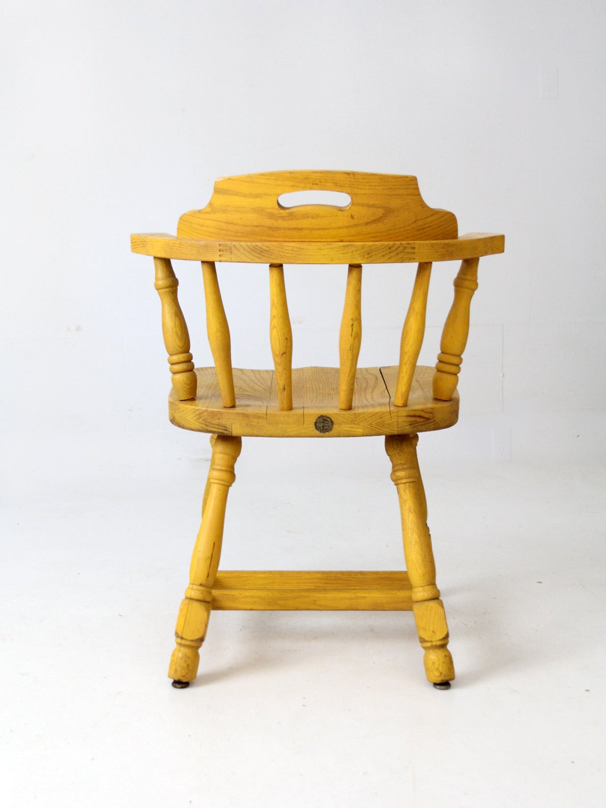 mid-century Buckstaff captains chair