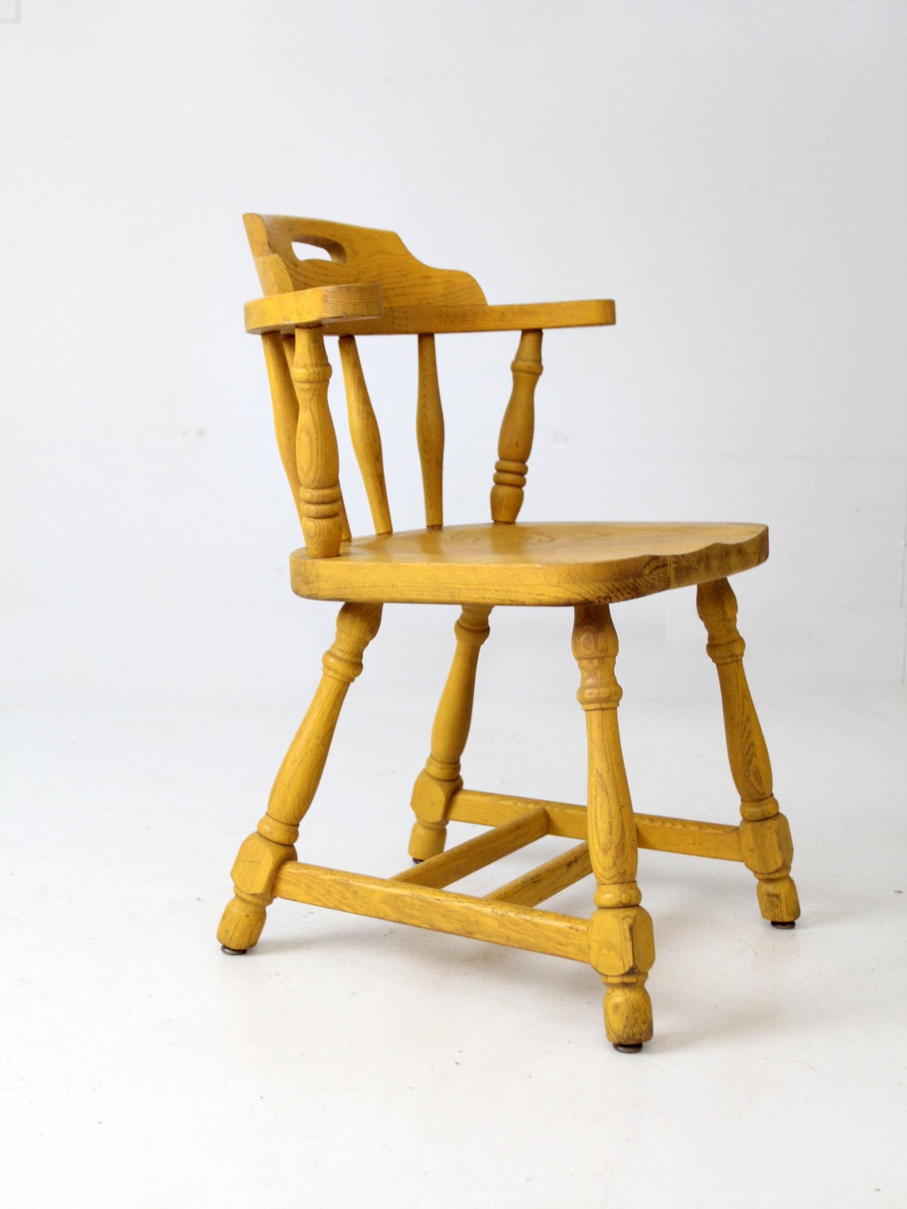 mid-century Buckstaff captains chair