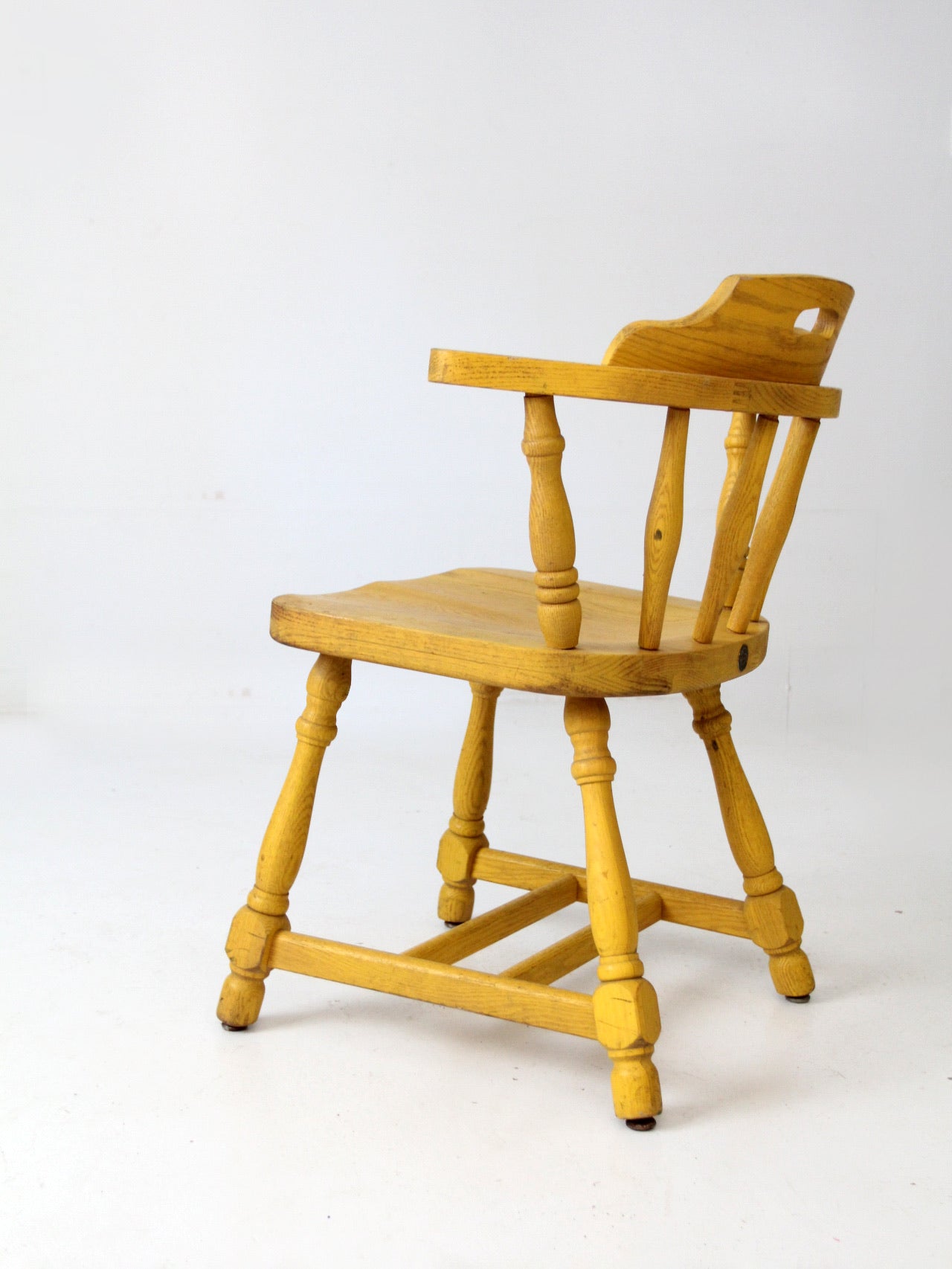 mid-century Buckstaff captains chair