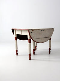 antique drop leaf five leg table