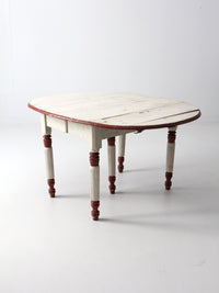 antique drop leaf five leg table