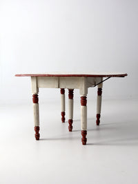 antique drop leaf five leg table