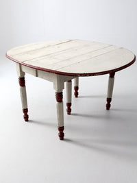 antique drop leaf five leg table