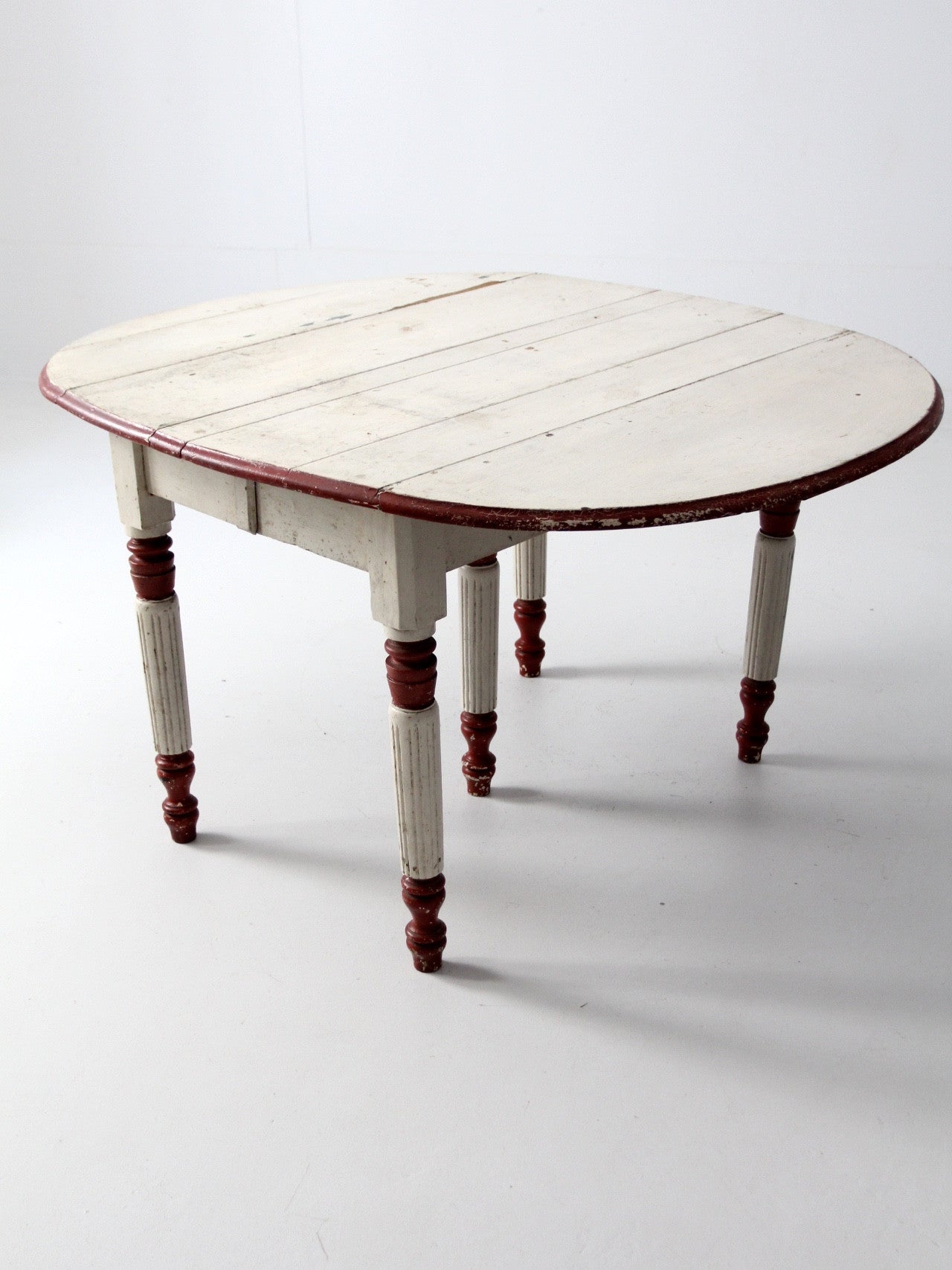 antique drop leaf five leg table