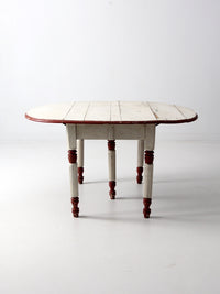 antique drop leaf five leg table
