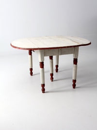 antique drop leaf five leg table