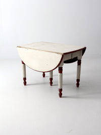 antique drop leaf five leg table