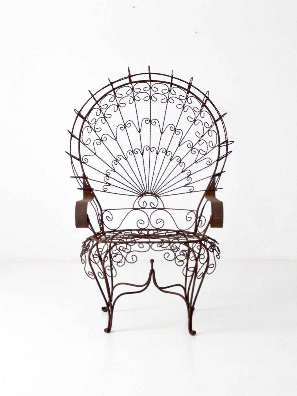 Wrought iron peacock chair discount