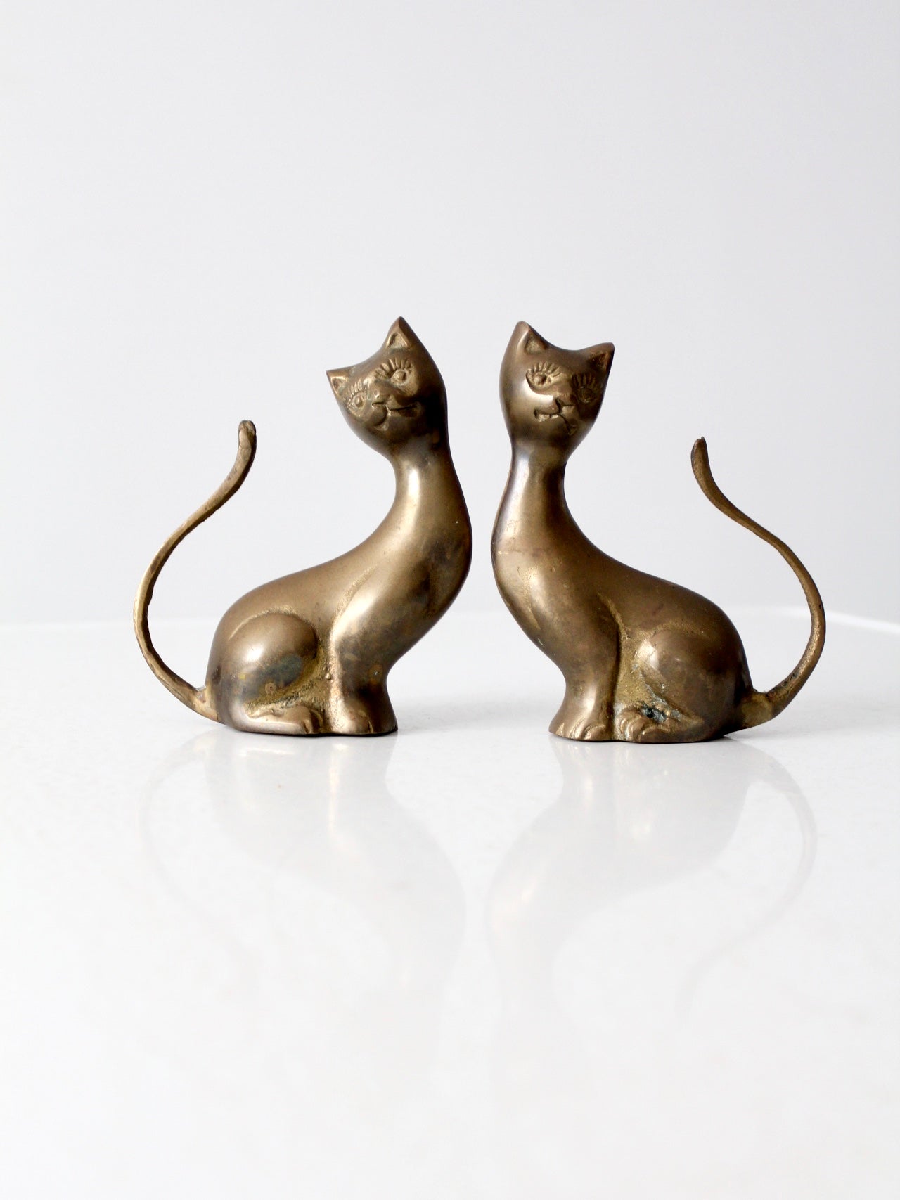 pair mid-century brass cats