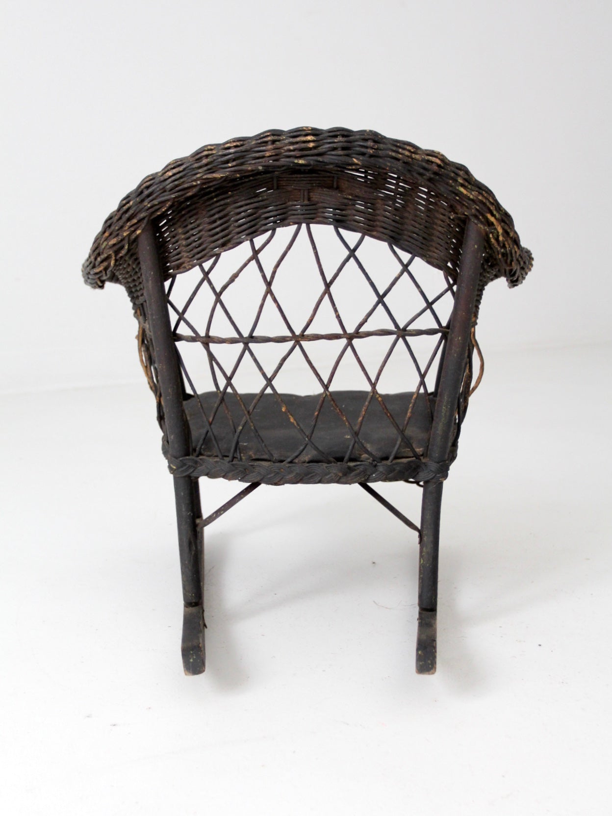 antique children's wicker rocking chair