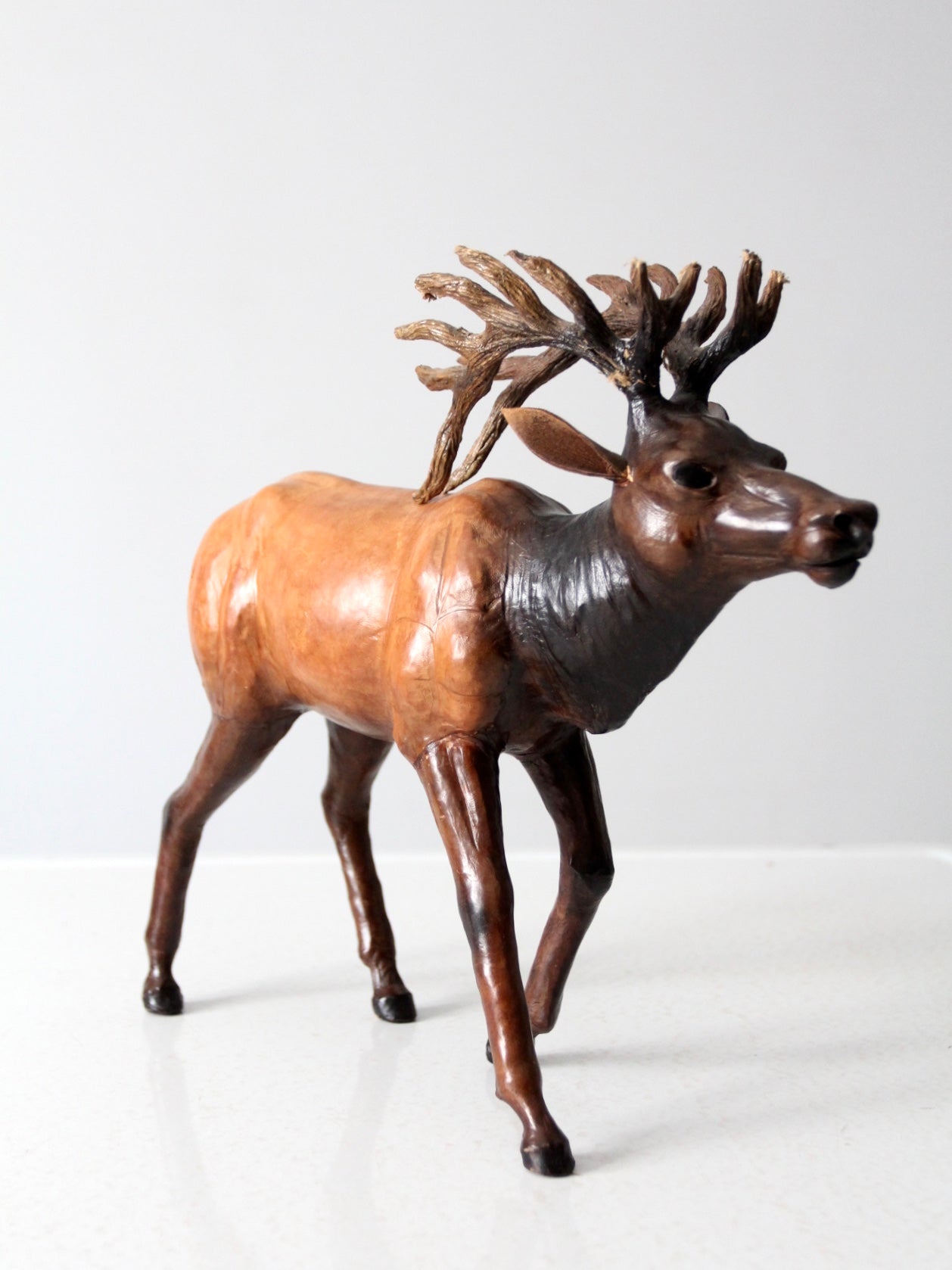 vintage leather reindeer sculpture