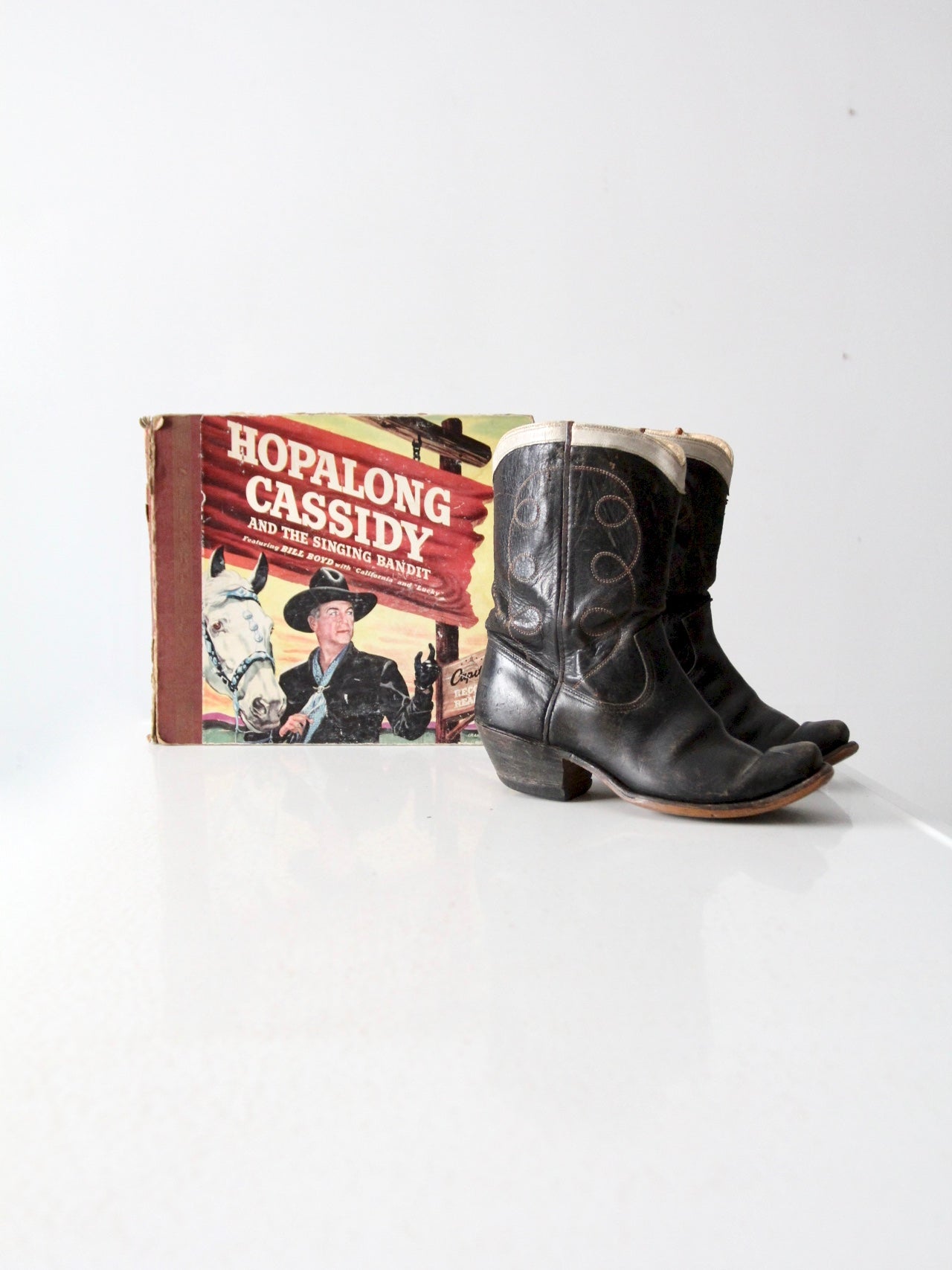 1950s Hoplalong Cassidy boots and record book