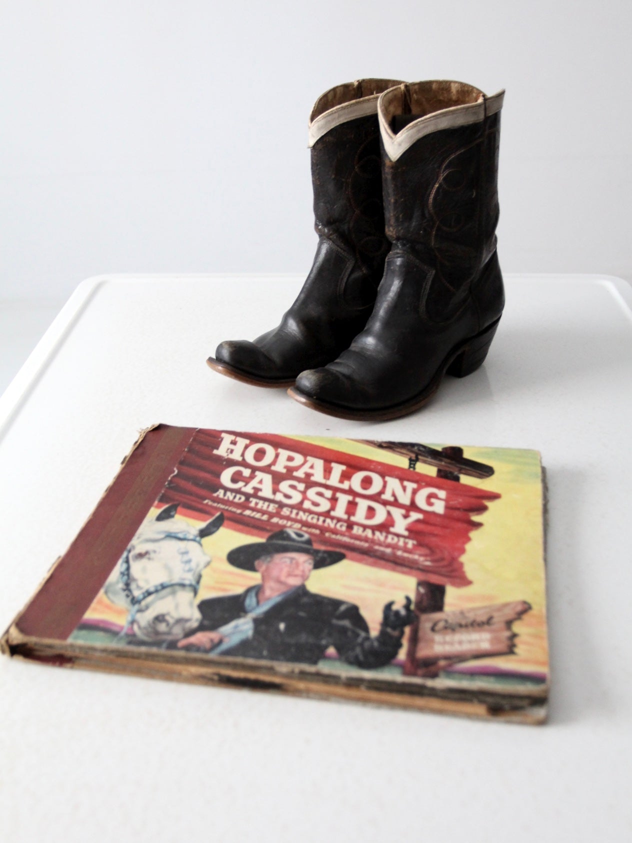 1950s Hoplalong Cassidy boots and record book