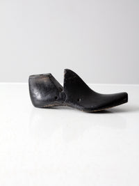 antique black wooden shoe form