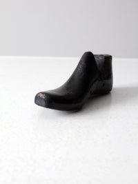 antique black wooden shoe form