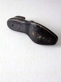 antique black wooden shoe form