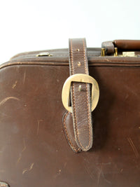 vintage brown leather suitcase