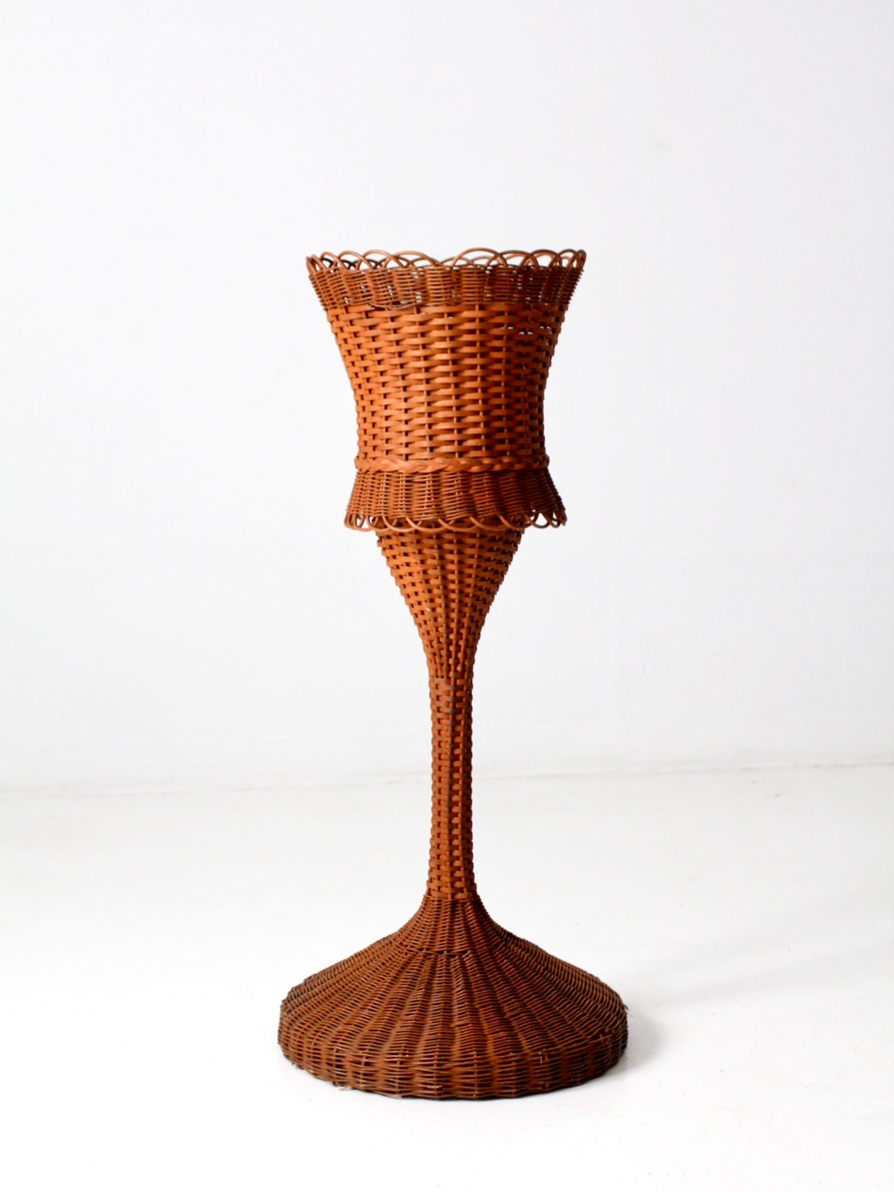 antique wicker plant stand