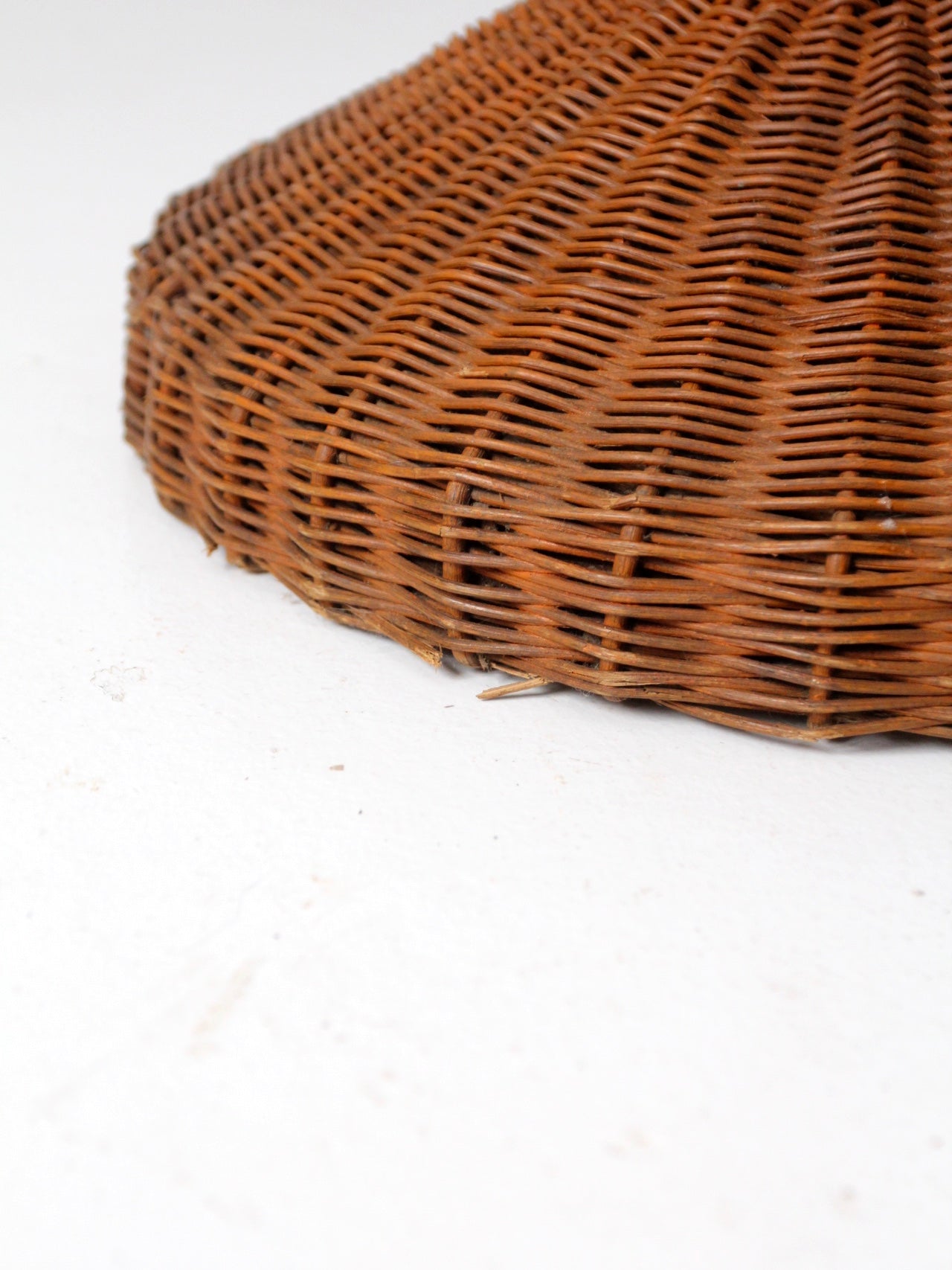 antique wicker plant stand