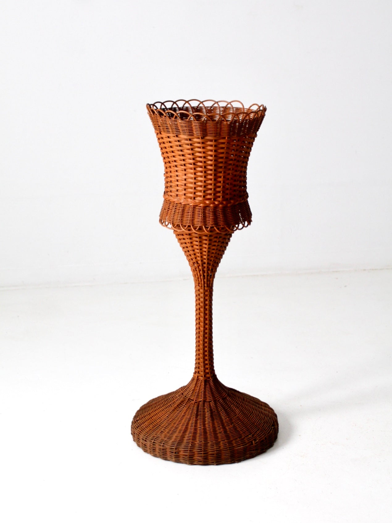 antique wicker plant stand