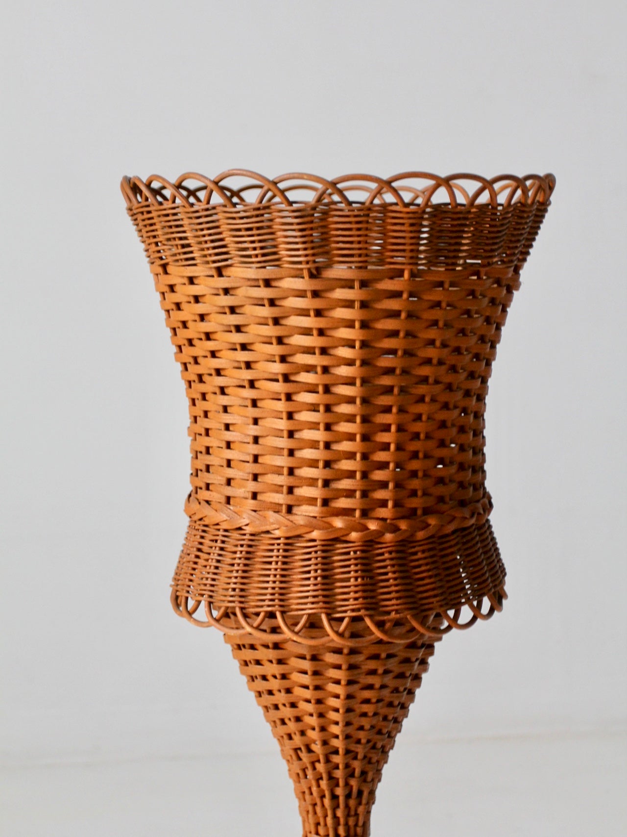 antique wicker plant stand