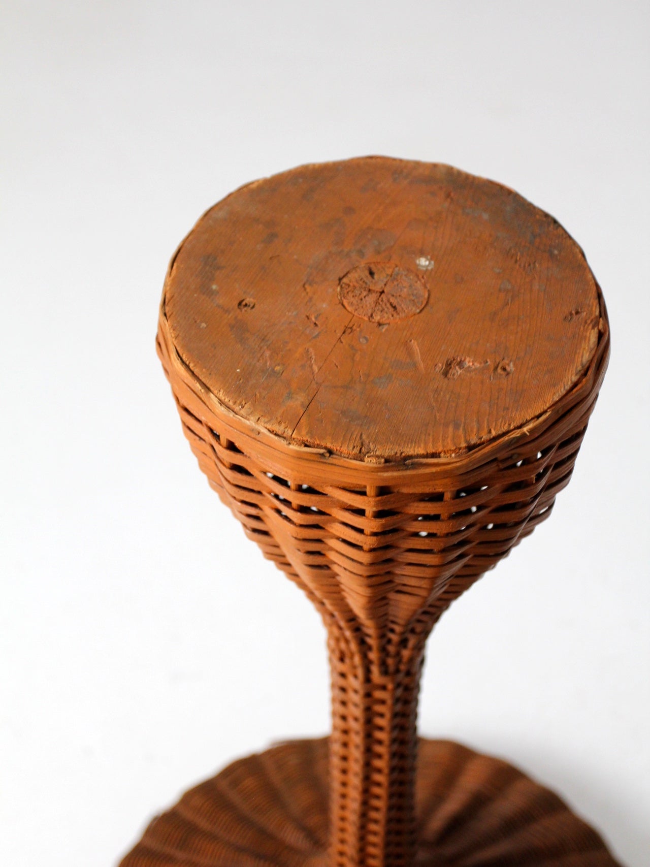 antique wicker plant stand