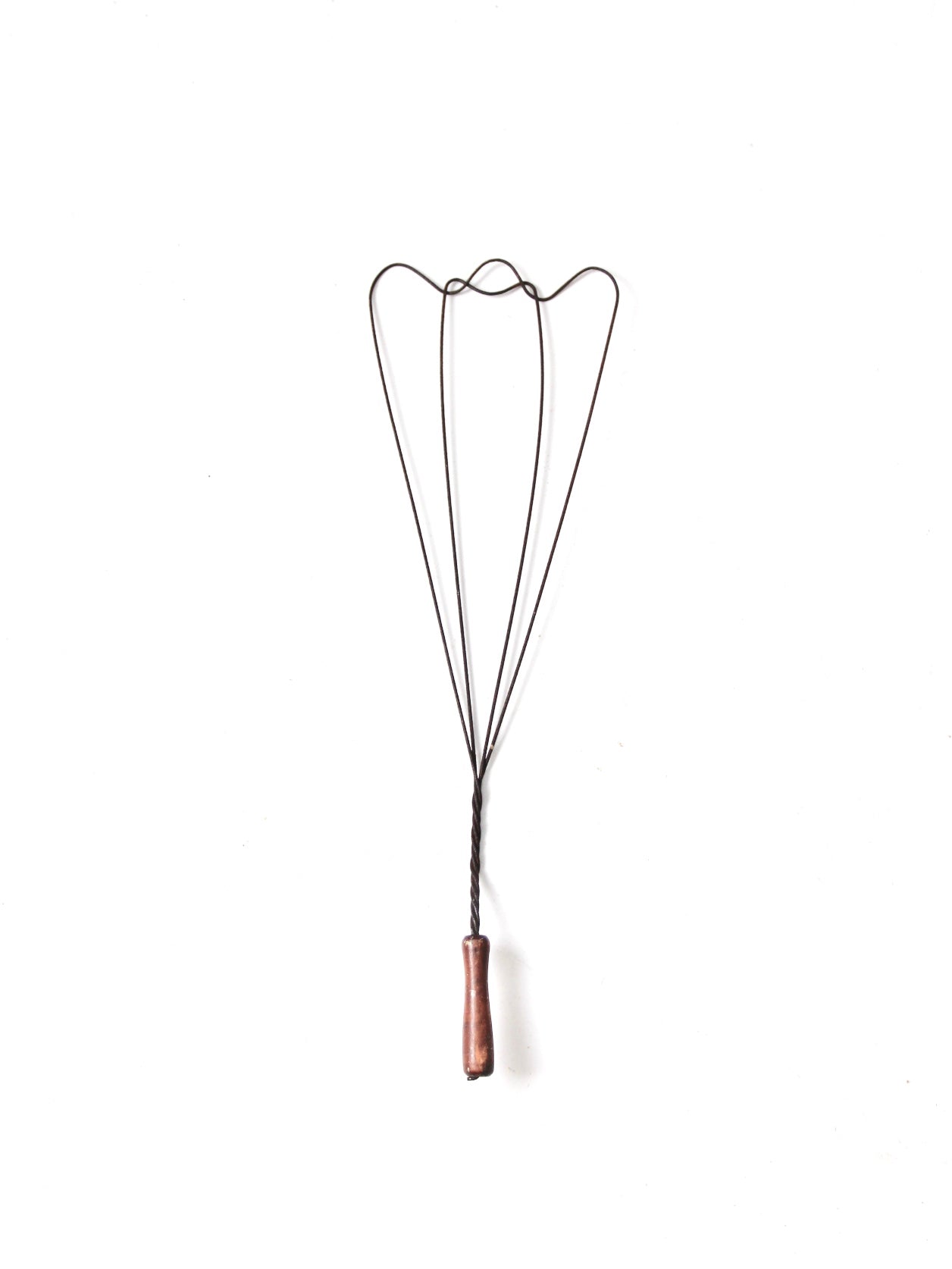 antique rug beater