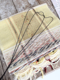antique rug beater