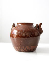antique earthenware water pot with rope handle