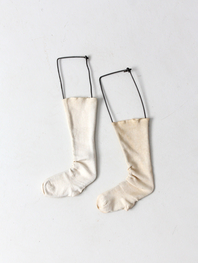 antique child size sock stretcher displays