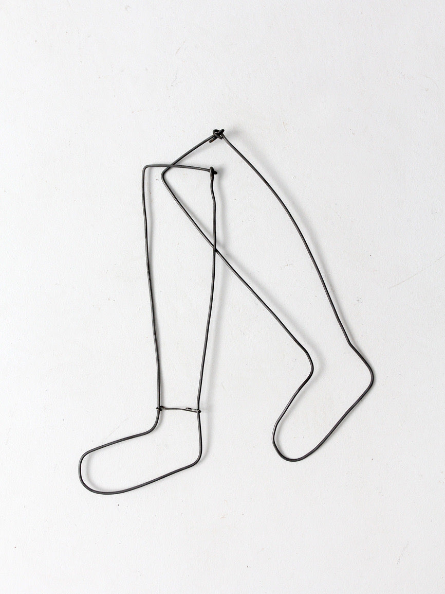 antique child size sock stretcher displays