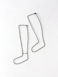 antique child size sock stretcher displays