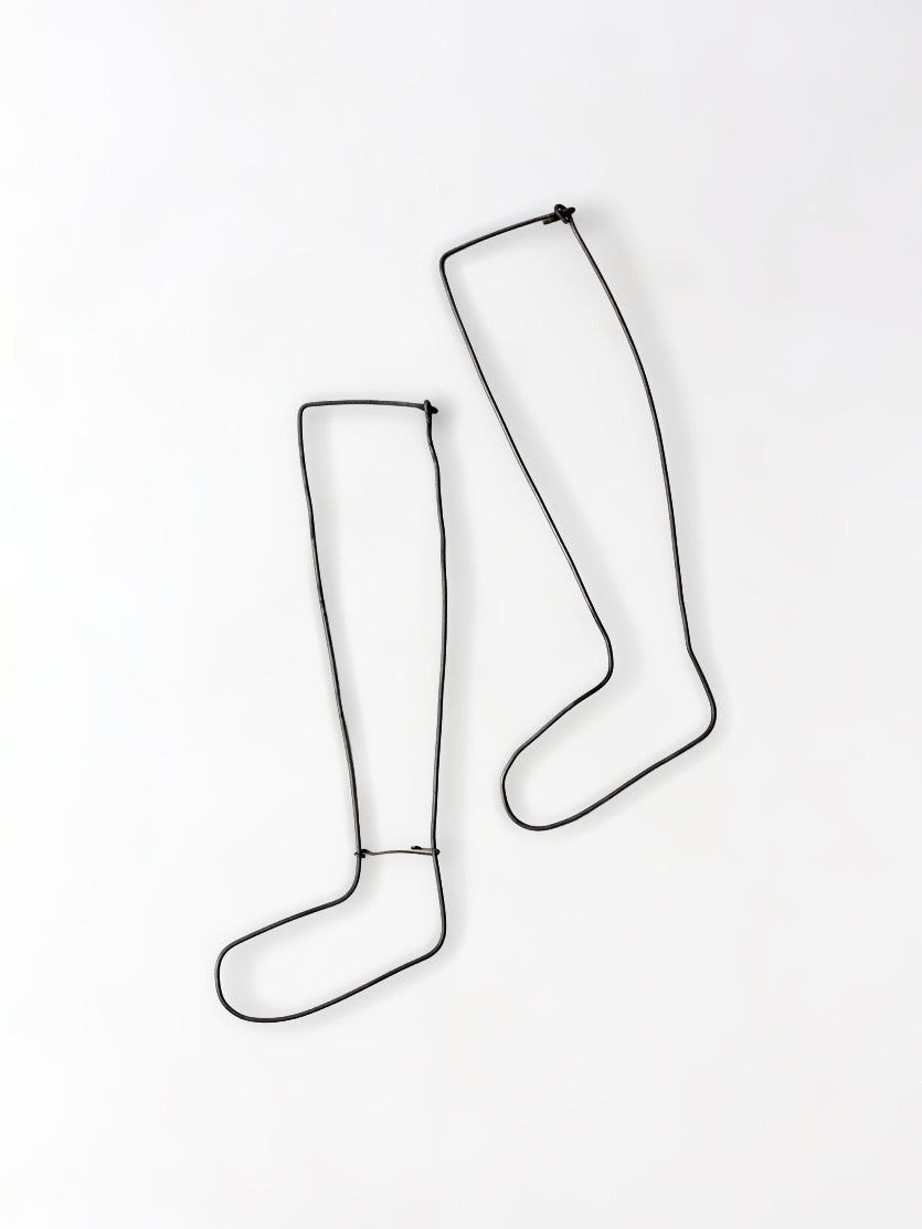 antique child size sock stretcher displays