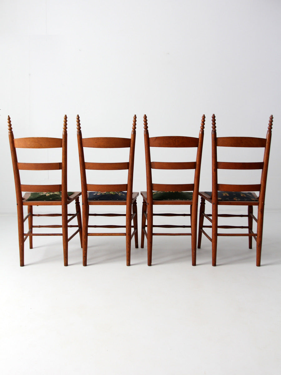 set of four Victorian ladder-back chairs with antique needlepoint seats