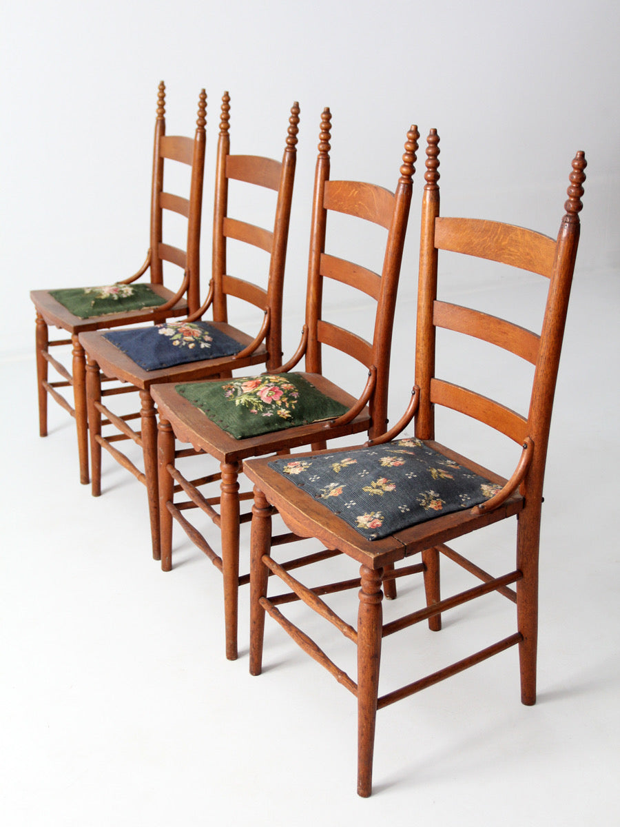 set of four Victorian ladder-back chairs with antique needlepoint seats